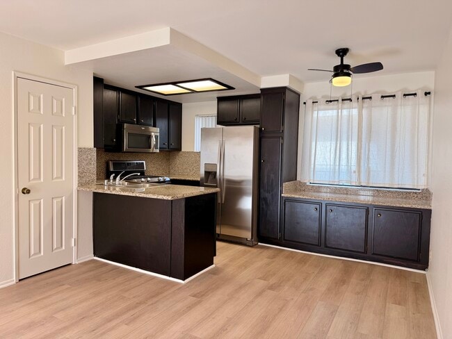 Building Photo - 10740 Lawler St Unit 10