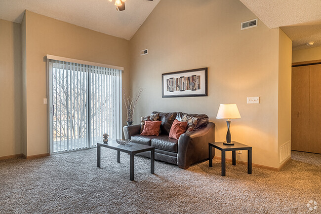 Bright living room with lots of natural lighting. - Skyline View Rental