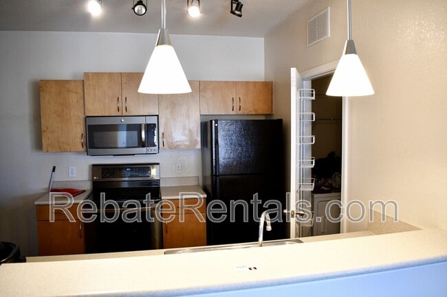 Photo - 8290 Gate Pkwy W Unit #415