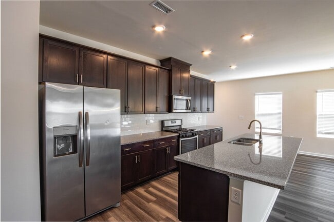 Building Photo - Spacious 4BR Home in Flowers – Loft, Covered Patio & Move-In Ready!