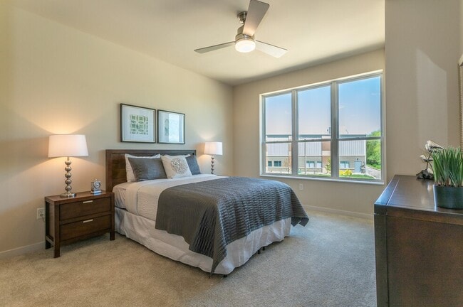 Spacious bedroom with beautiful windows