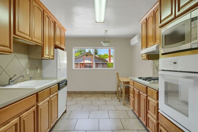 Photo - Charming 2 Bed 1 Bath Duplex Unit with Beautifully Landscaped Backyard