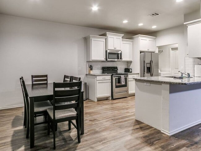 Photo - Modern 3BR/2BA Duplex | All Utilities Included | Downtown Edmond