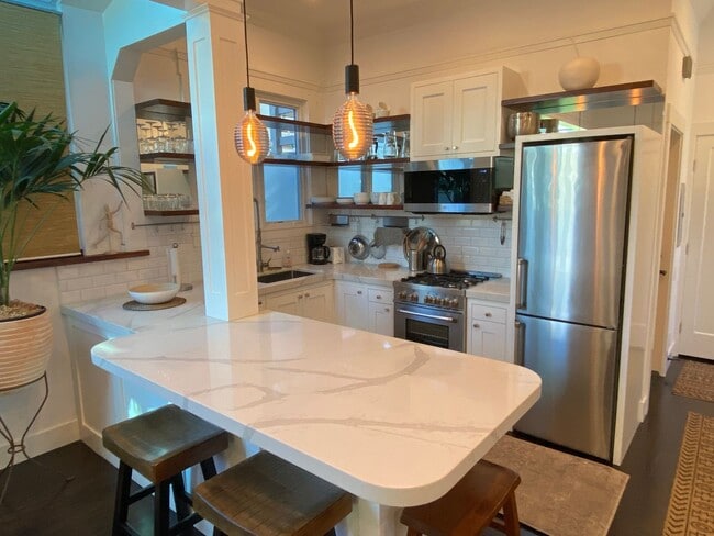 Photo - Exquisite top floor 1BD. Fully furnished a...