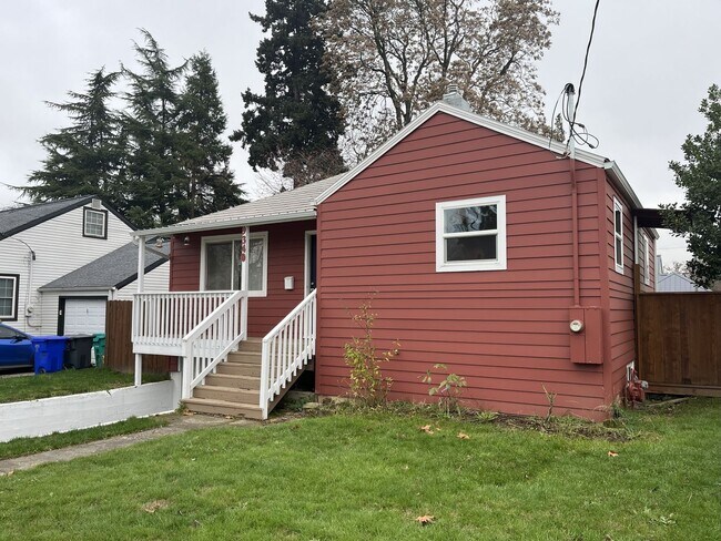 Photo - Charming 2-Bedroom Home with Hardwood Floors, Bright Living Spaces & Large Fenced Yard
