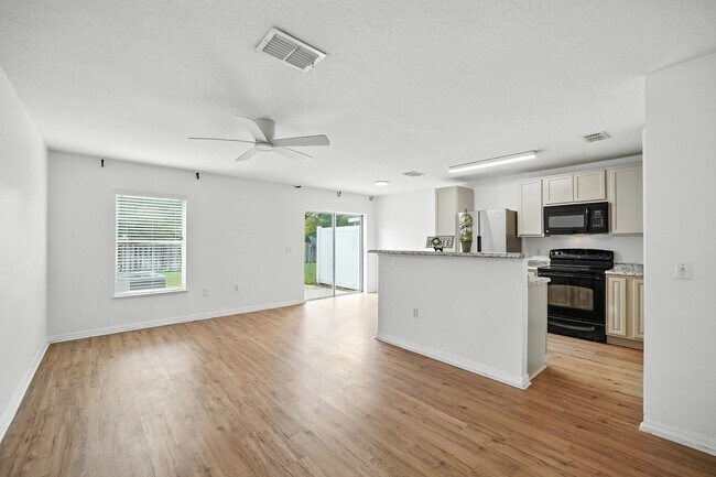 Photo - 32218 Gem: Open-Concept Townhome Minutes from the Airport