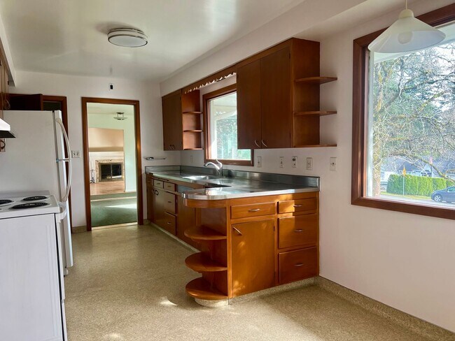 Photo - Charming 4 Bedroom Home with Fully Fenced Backyard!