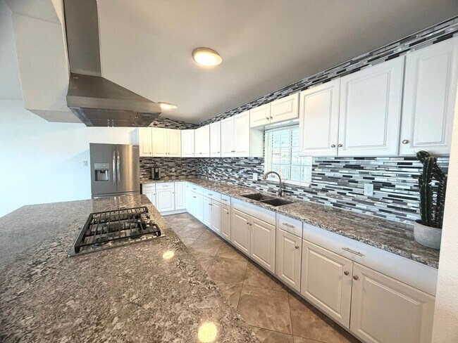 Photo - **$500 OFF MOVE IN BY 07/31/2026**Charming Single-Story Home with No HOA & Beautiful Outdoor Living!
