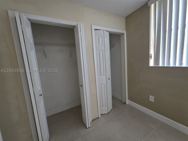 Building Photo - 8006 SW 149th Ave Unit D205