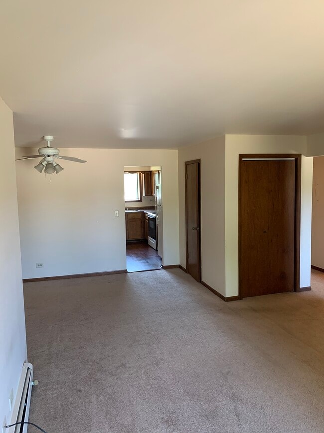 Open floor plan of dining room and family room - 1200 Whispering Hills Ct Unit 1A