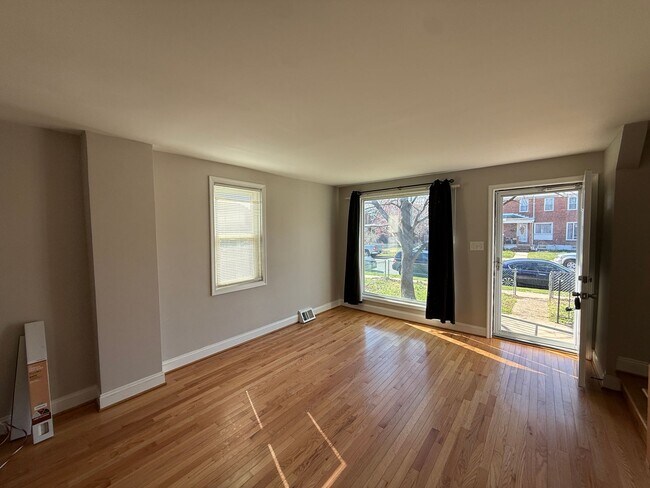 Photo - End Unit 3BR Townhome in Dundalk | Covered Porch, Fenced Yard, Central A/C + Off Street Parking