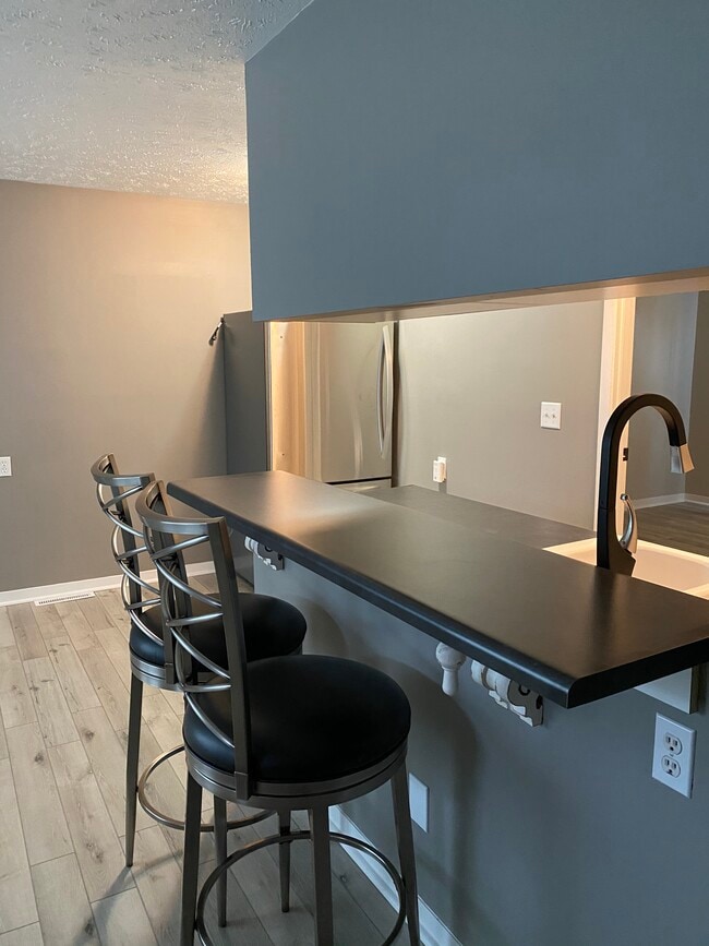 open concept for kitchen and living room - 403 W Boone St