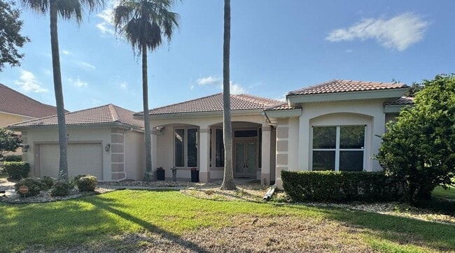 Building Photo - 4/3 Pool Home in Pelican Bay