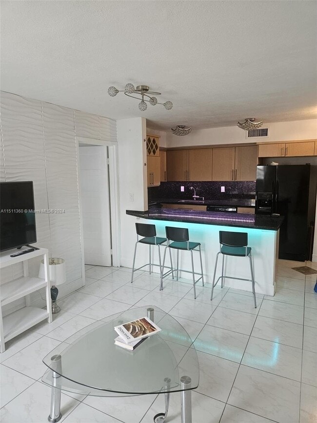 Photo - 8425 Harding Ave Condo