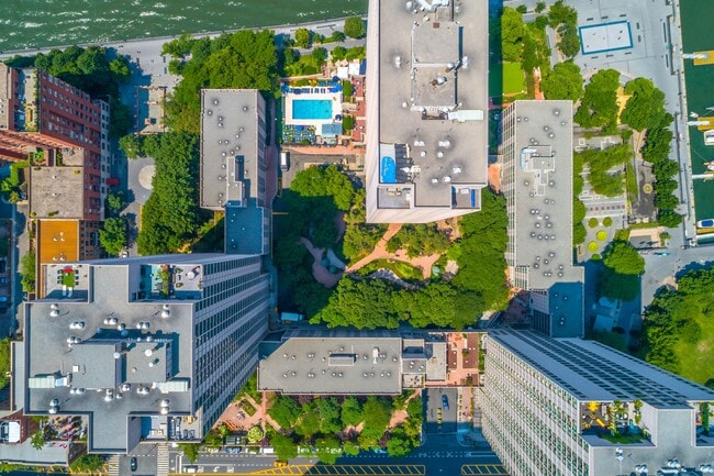 Amenities include an outdoor pool, fitness center, and private park