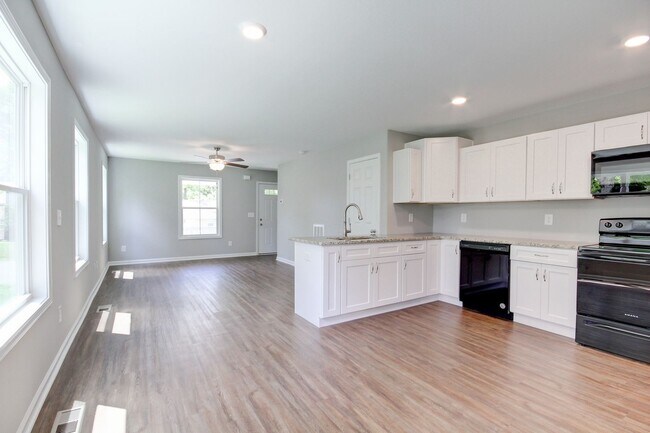 Photo - Two Story Duplex With Hardwood Flooring an...