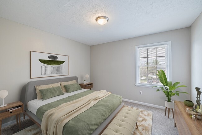 Staged bed 1 - Blue Ridge Apartments