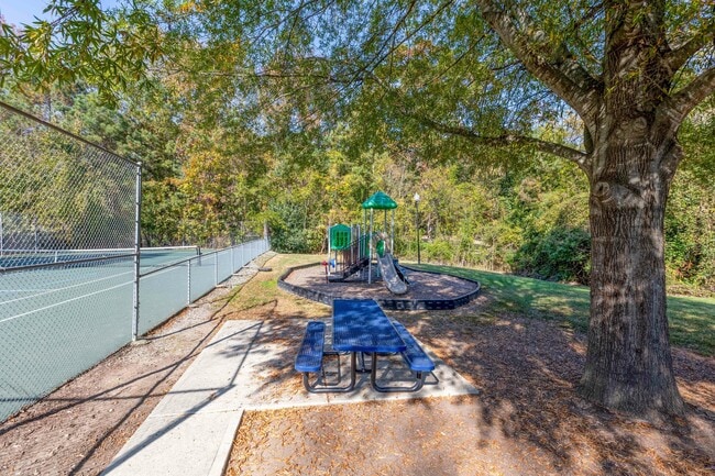 The-Greens-at-Tryon-Apartments-in-Raleigh-NC-Playground-and-Tennis-Court - The Greens at Tryon