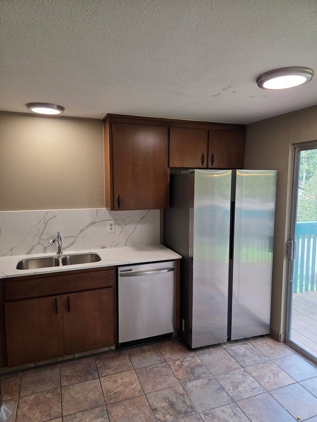 Photo - Spacious Covington Home with all New Appliances, Fresh Paint and Large Fenced Yard!