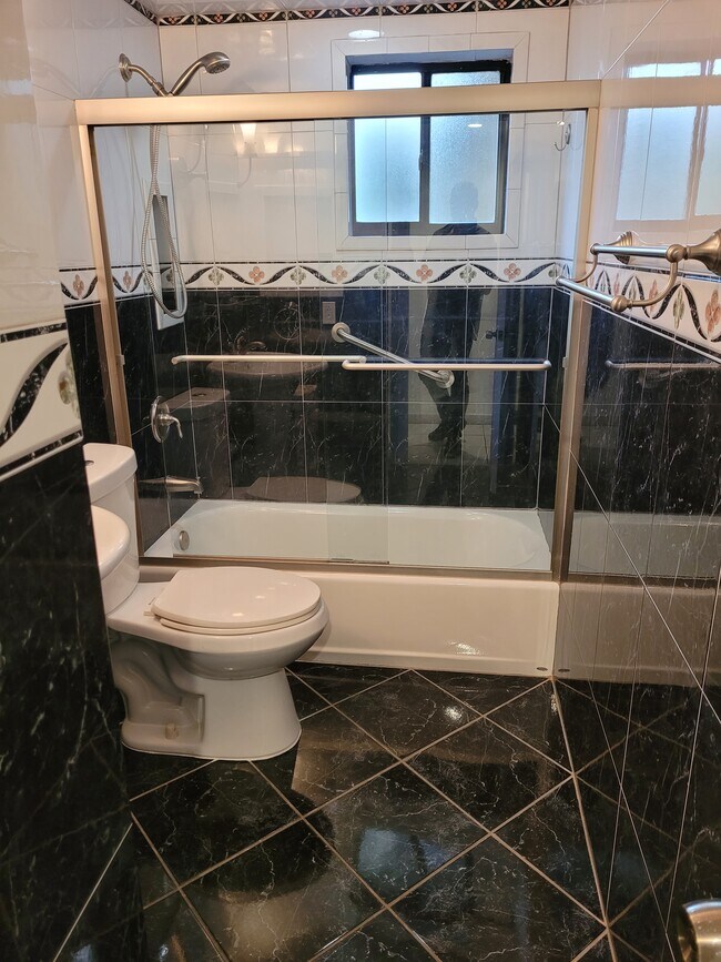 Guess Bathroom - 8615 NW 8th St Unit 402