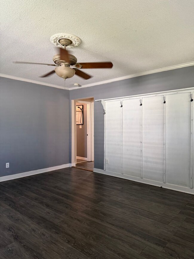 Photo - Charming 2-Bedroom Home with an Enclosed Sunroom & Peaceful Outdoor Living