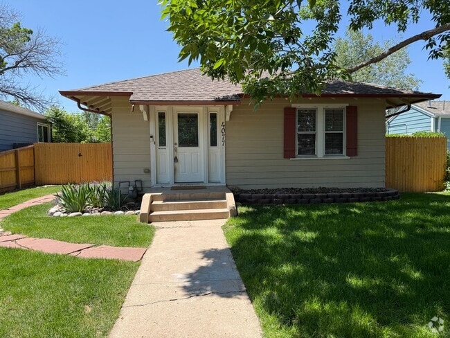 Building Photo - Evolve Real Estate: Charming Ranch Home wi...