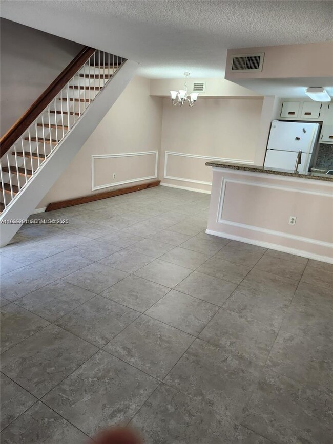 Building Photo - 665 NW 85th Pl Unit 10-212