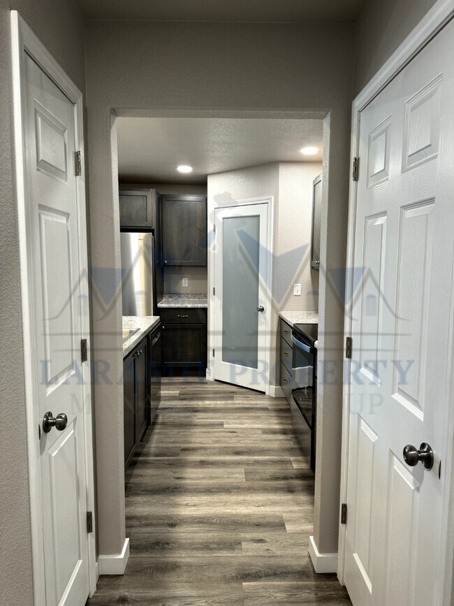 Photo - 4-Bedroom, 4.5 bath Condo - 1/2 OFF 1ST MO... Unit 206A