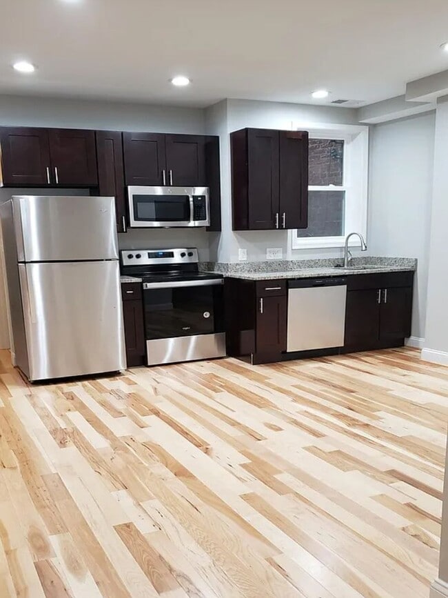 Building Photo - 3012 Guilford Ave Unit 1