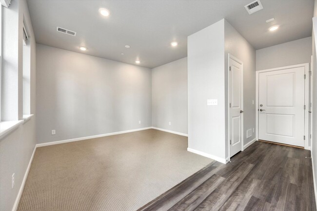 Photo - Gorgeous NEW Three Story Townhome with two car attached garage!