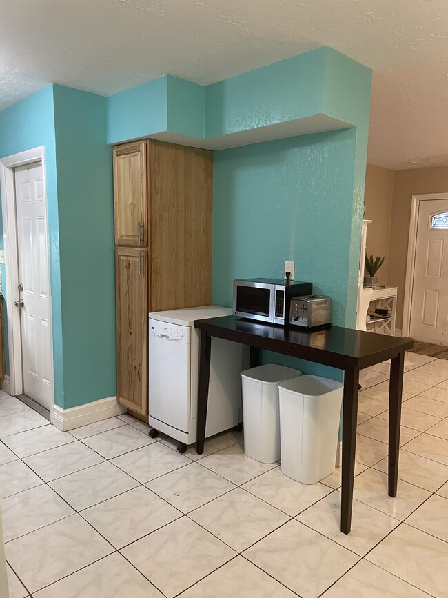 Pantry storage or dishwasher - 6449 101st Way N House