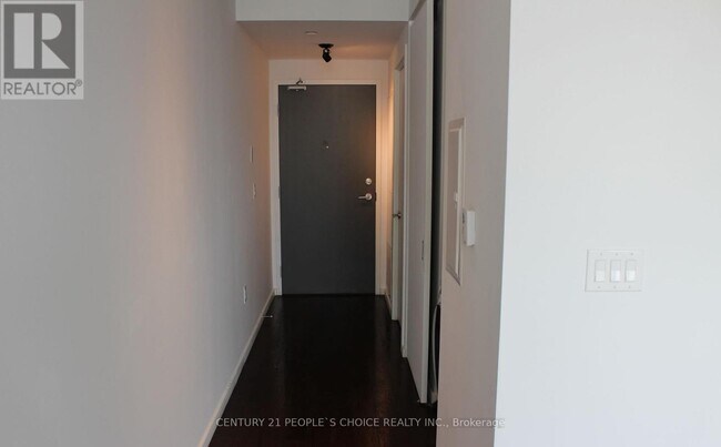 Photo - 21 Lawren Harris Square Unit 910