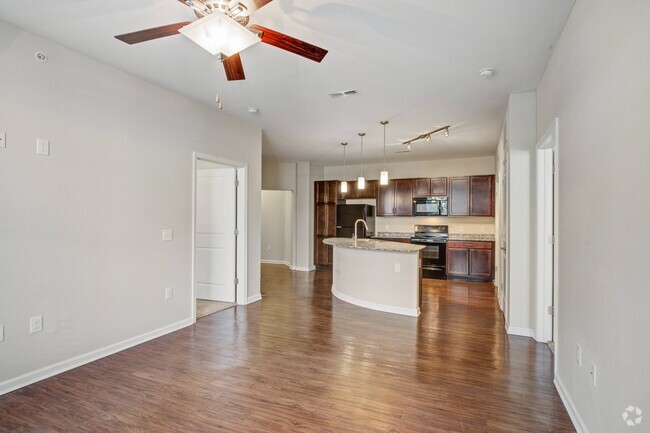 Stunning Kitchen with Hardwood-Style Flooring - Reveal on Cumberland Apartments