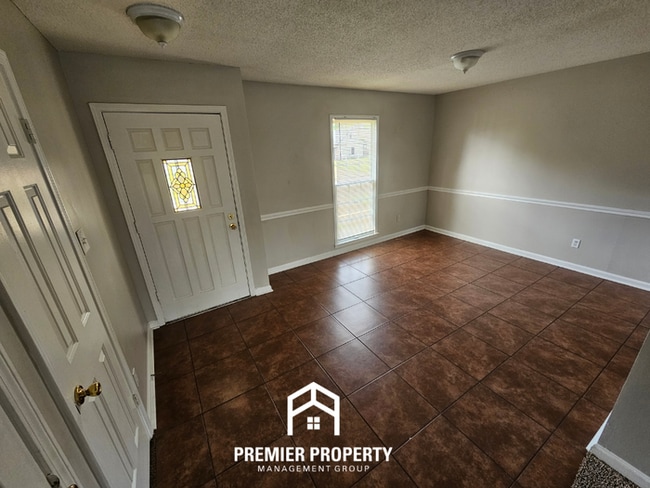 Photo - Quiet Cove Living in 38115 | 3BR/2BA with Brick Fireplace & Fenced Yard