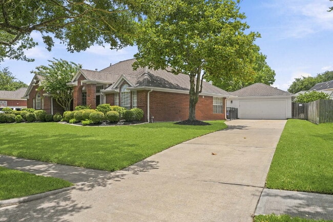 Photo - Refreshed 4-Bedroom in New Territory with New Paint, New Floors, and Lawn Care Included.