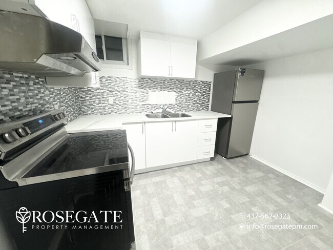 Photo - Modern 2-Bedroom Basement Apartment with In-Unit Laundry & Parking – Mississauga Unit 2