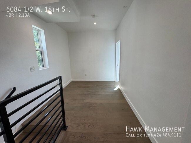 6084 1/2 W. 18th St.-