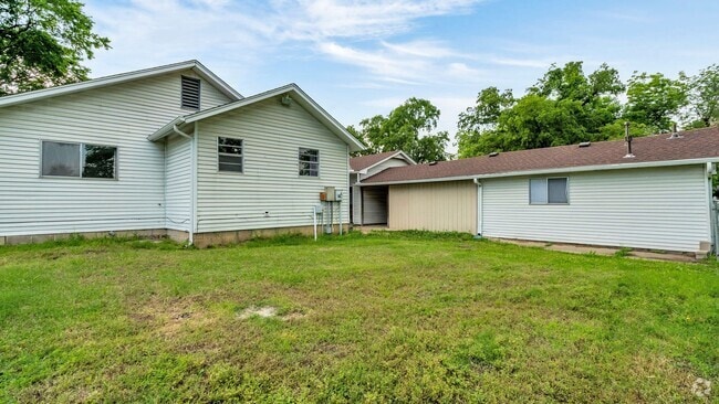 Building Photo - 1307 S 77th E Ave Unit Back Rental