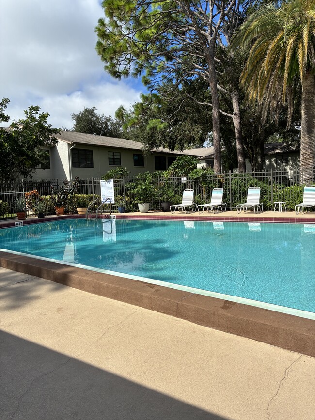 Heated pool for year round seimming - 3038 Eastland Blvd Unit Imperial oaks condominium