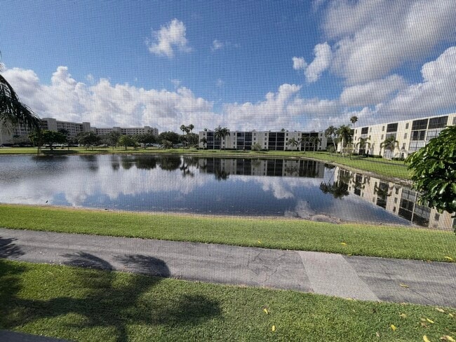 Building Photo - 7340 Amberly Ln Unit #205 Rental
