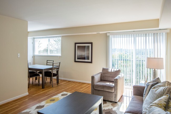 Living Room with View to Dining Room - Longview Terrace Apartments