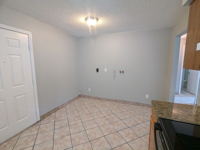 Photo - Spacious 2-Bedroom, 1-Bath First-Floor Condo for Rent. Furry friends welcome! Unit 6