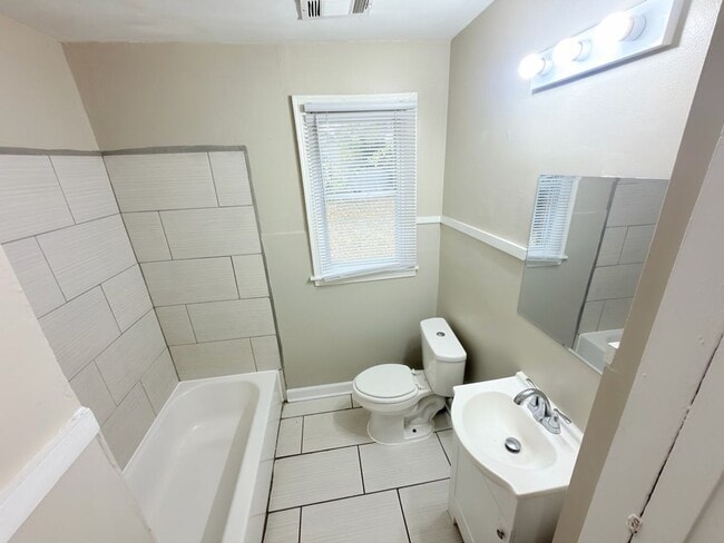 Photo - Charming Memphis Home with Spacious Yard – Move-In Special!