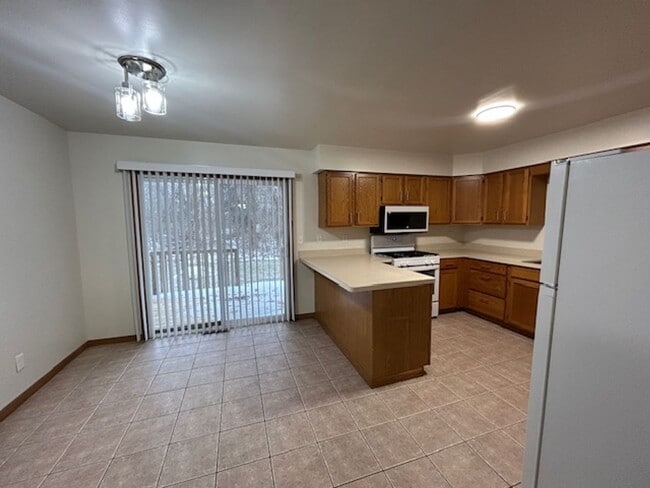 Photo - 2 bedroom 1.5 bath TOWNHOUSE with double private balconies and private view of the woods! Unit 1234 Lake Charles