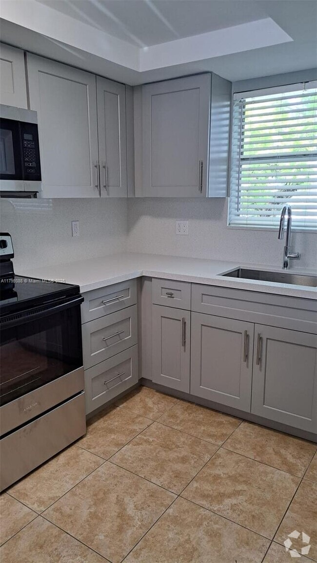 Building Photo - 9371 Fontainebleau Blvd Unit I214 Rental
