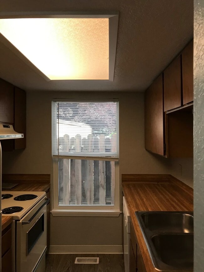 Photo - Updated 2 BR / 1.5 BA End Unit – Private Yard & Fresh Interior!
