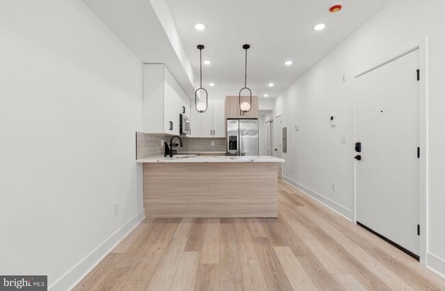 Building Photo - 5034 Florence Ave Unit 1