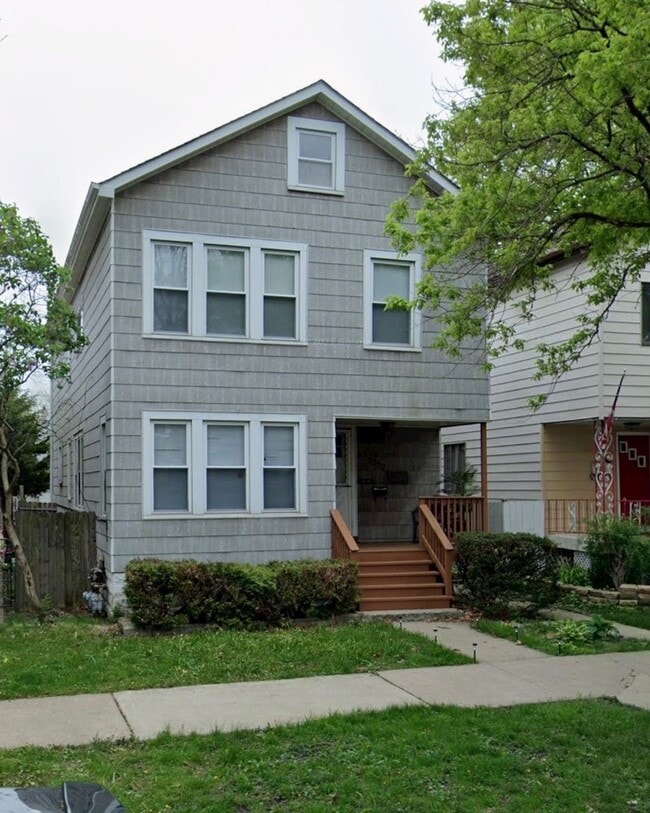 Building Photo - 5252 N Ludlam Ave Unit 2