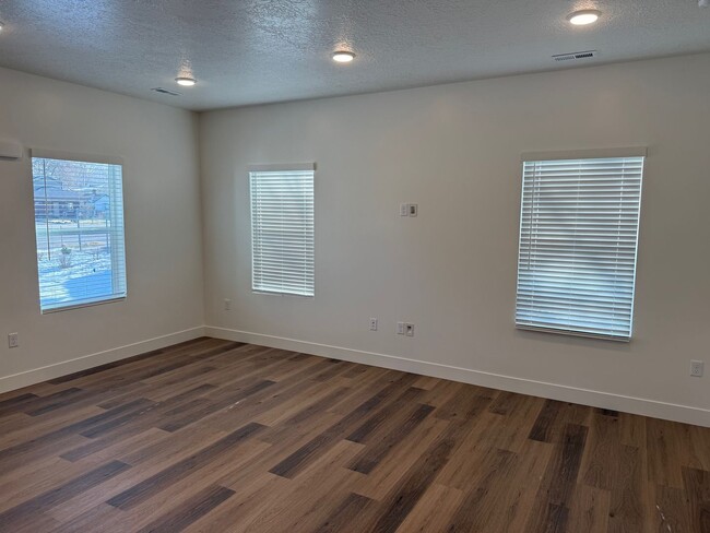 Photo - Half off first months rent - Beautiful townhome with 2 car garage, Central Air and Master Suite
