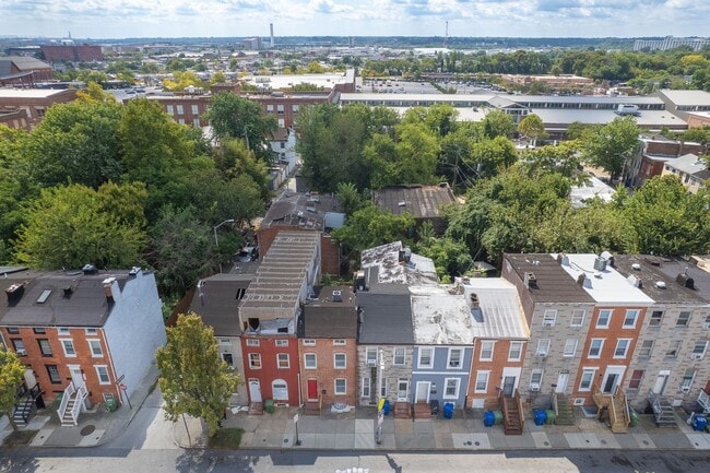 Photo - Spacious 2BR/2.5BA Townhome with Finished Basement & Extra Storage